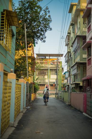 Two boys on a bike on Fern Road, Kolkata
