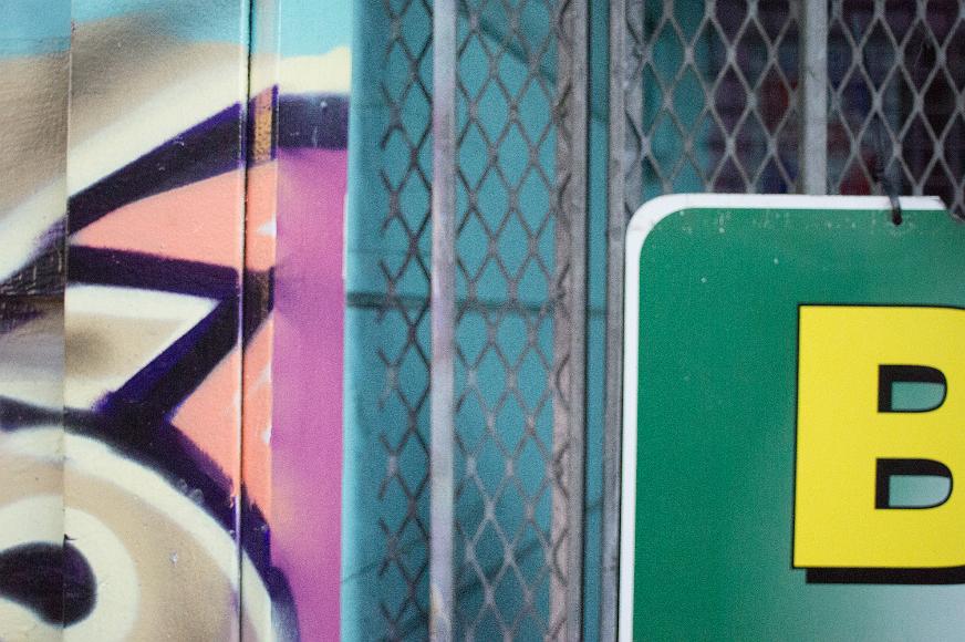 Abstract and B Closeup of graffiti and a sign in the Lower Haight neighborhood of San Francisco