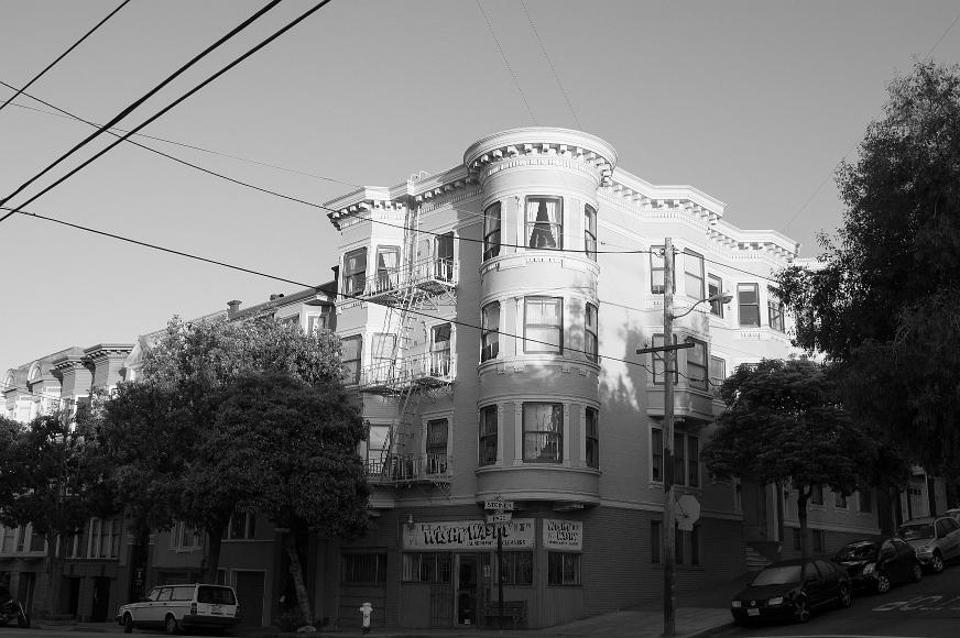 Steiner and Page Laundromat and apartments in the Lower Haight at sunset