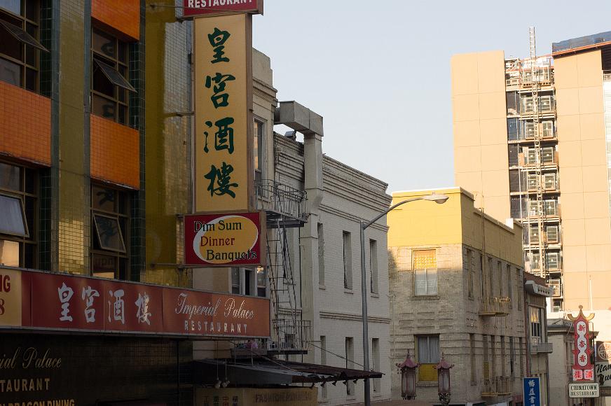 Chinatown street scene Buildings in Chinatown in San Francisco in the late afternoon sunlight