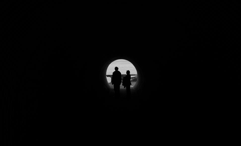 At the end of the tunnel Ashoke and Swapna stand at the end of a pedestrian tunnel underneath Pacific Highway 1 near McWay falls in Julia Pfieffer State Park in central coastal...