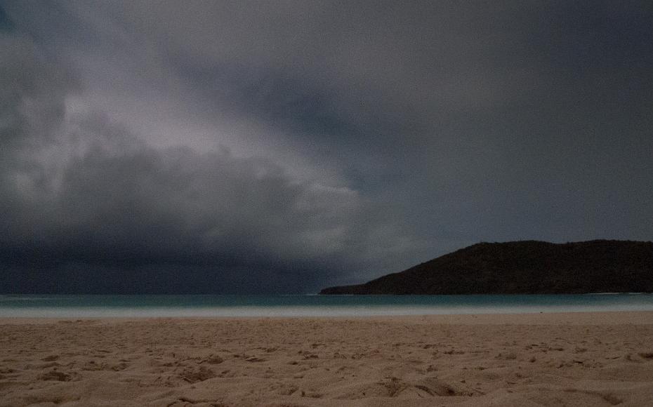 Beach scene at night during a storm in Culebra