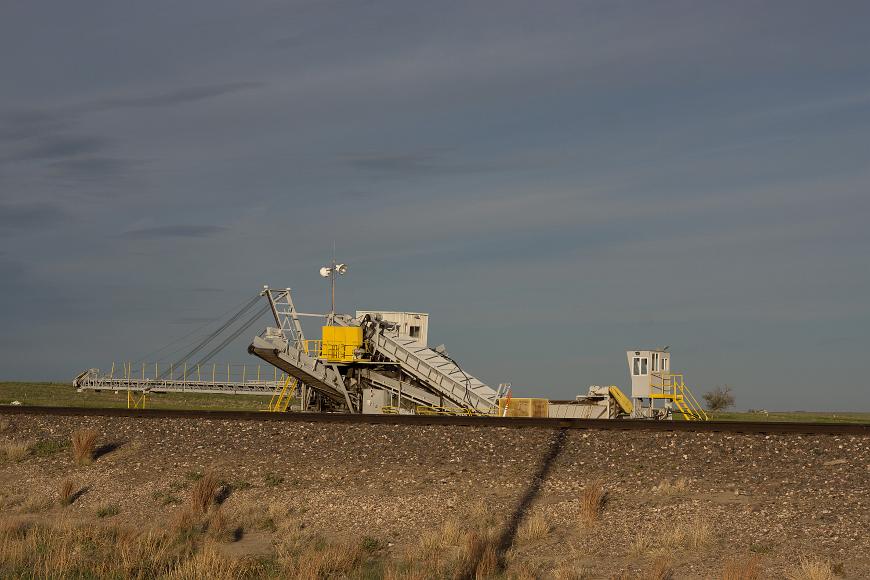 Loading machine Machine that has conveyor belt to load material onto train cars