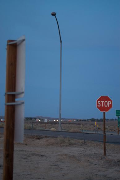 Stop sign Stop sign alongside an interstate highway in rural california