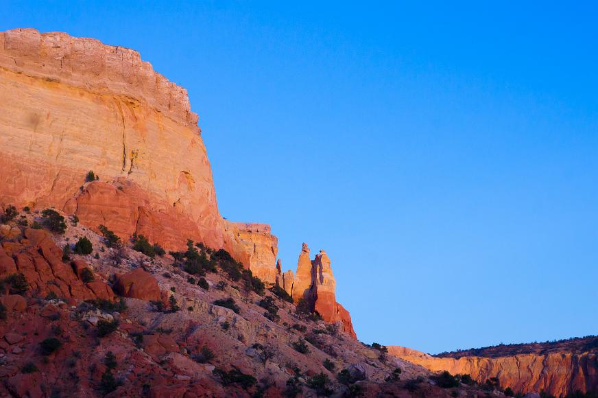 Sandstone Canyons at Ghost Ranch Red and orange and yellow sandstone canyons covered in juniper and pinon pine at Kitchen Mesa at Georgia O'Keefe's Ghost Ranch near Chama New Mexico