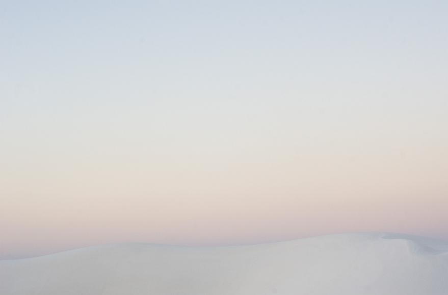 White Sands 2012 07 White gypsum sand dunes underneath a pink and purple dusk sky in White Sands National Monument in New Mexico