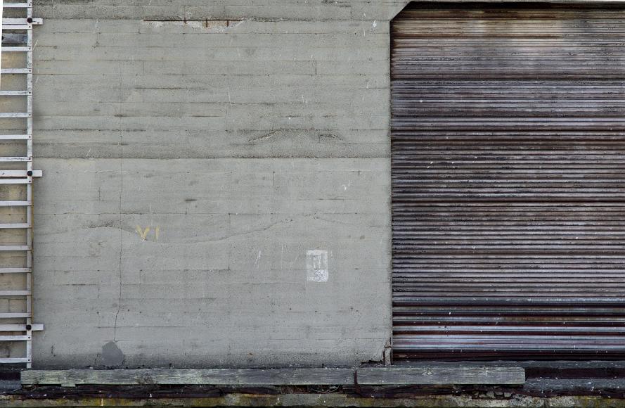 San Francisco Pier Detail #4 corrugated metal door concrete wall with exposed rebar and peeling ladder